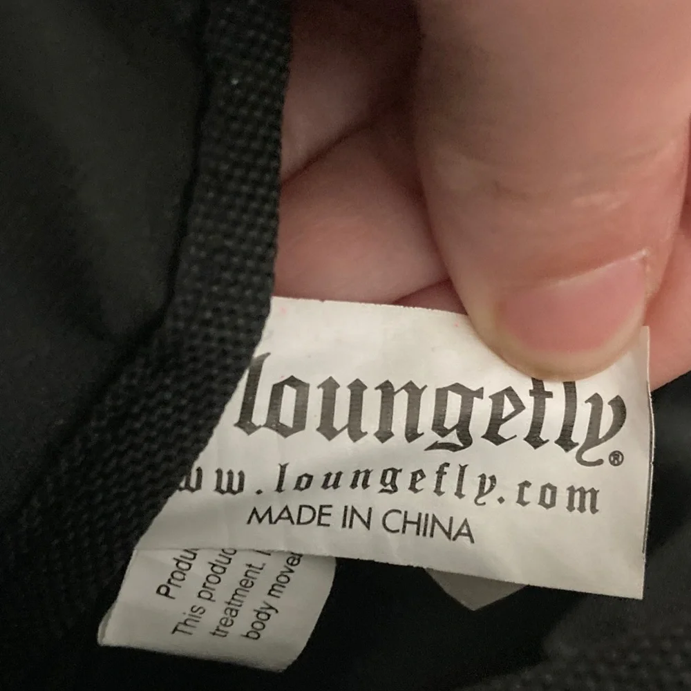 Loungefly Black and Purple Unicorn Backpack